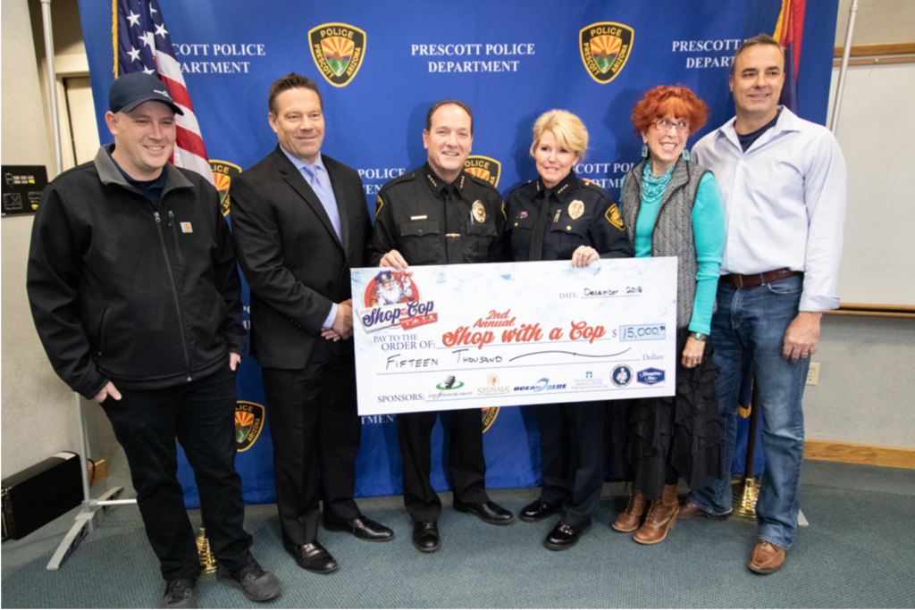 Fain Signature Group and its Multimedia Division Help Raise $15,000 for Cops and Kids