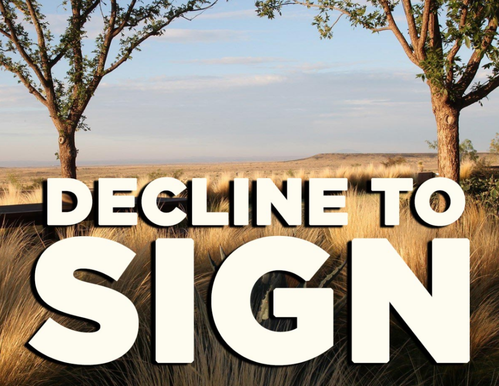 "Decline to sign" is displayed on an open grassy background.