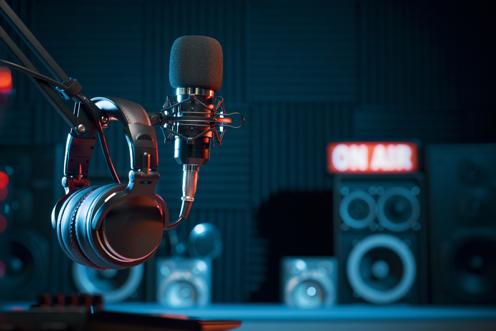 Professional microphone and headphones at the radio station